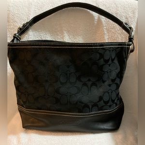Coach purse. Black signature canvas with silver